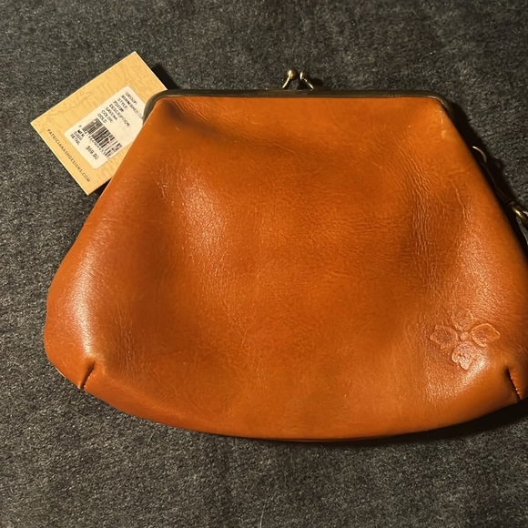 Burnished tooled coin purse style wristlet with strap. Used twice. - Picture 2 of 3